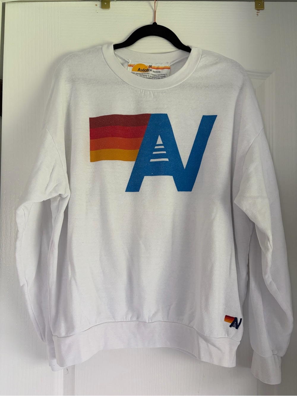 Aviator Nation White Crewneck with Blue AV Logo and Red-Orange-Yellow Stripes